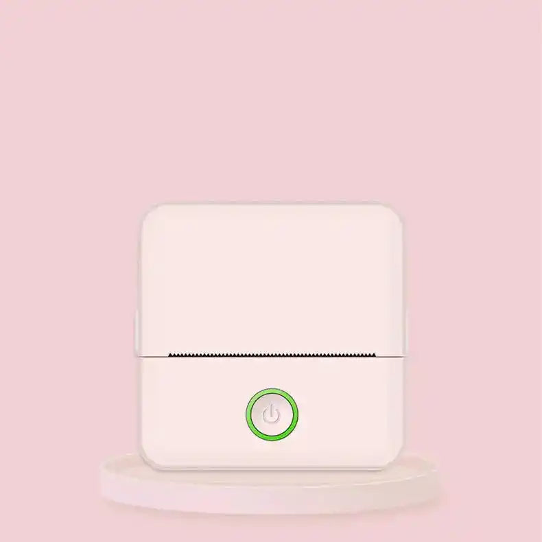 Minimalist pink portable thermal printer with a green power button, ideal for compact and stylish printing.