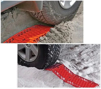 Car tire traction emergency grip tracks in use on sand and snow, providing enhanced tire grip for vehicles in challenging terrains.