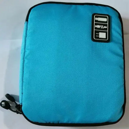 Blue portable gadget organizer bag with dual zippers and a label for storing electronic accessories.