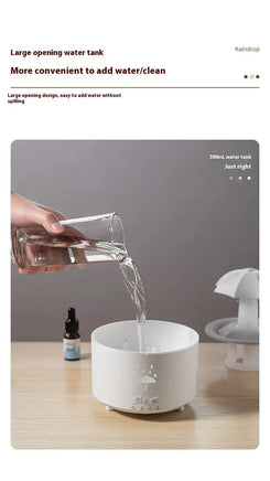 White Raindrop Aromatherapy Humidifier with a large opening water tank, making it easy to refill and clean for convenient use.